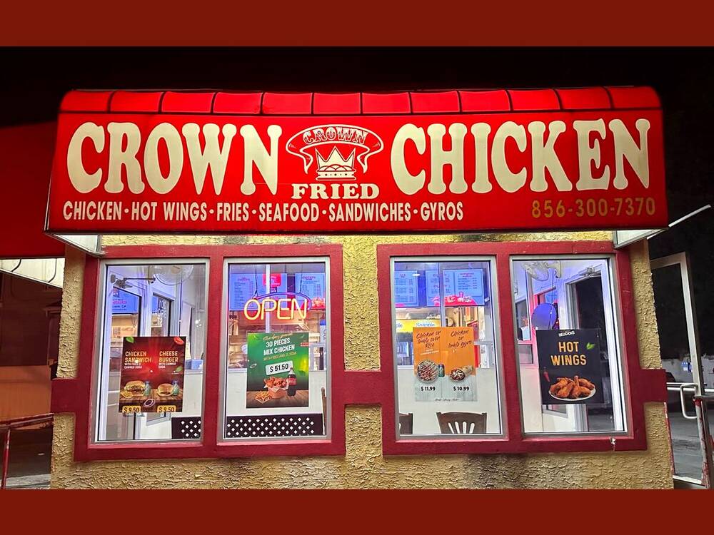 Crown Fried Chicken lit up at night, East Broad Street, Millville NJ